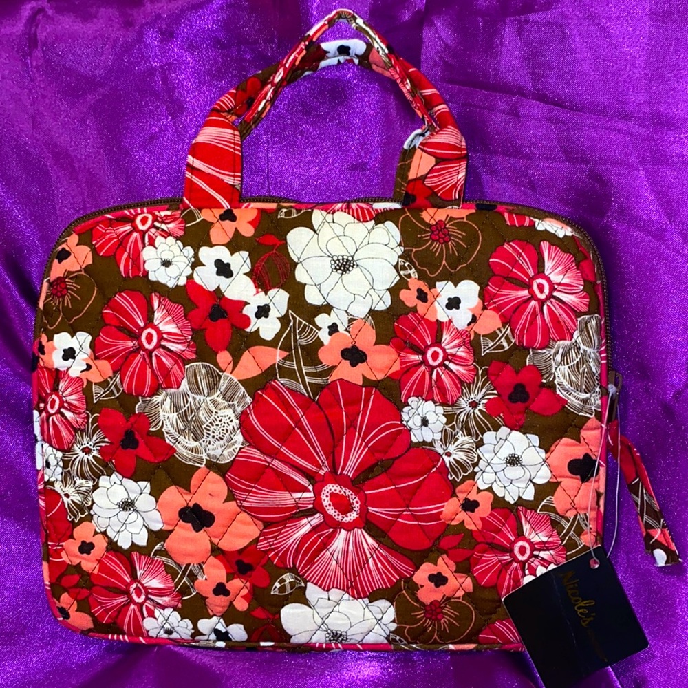 IPad Case. Two handles with a flower design.